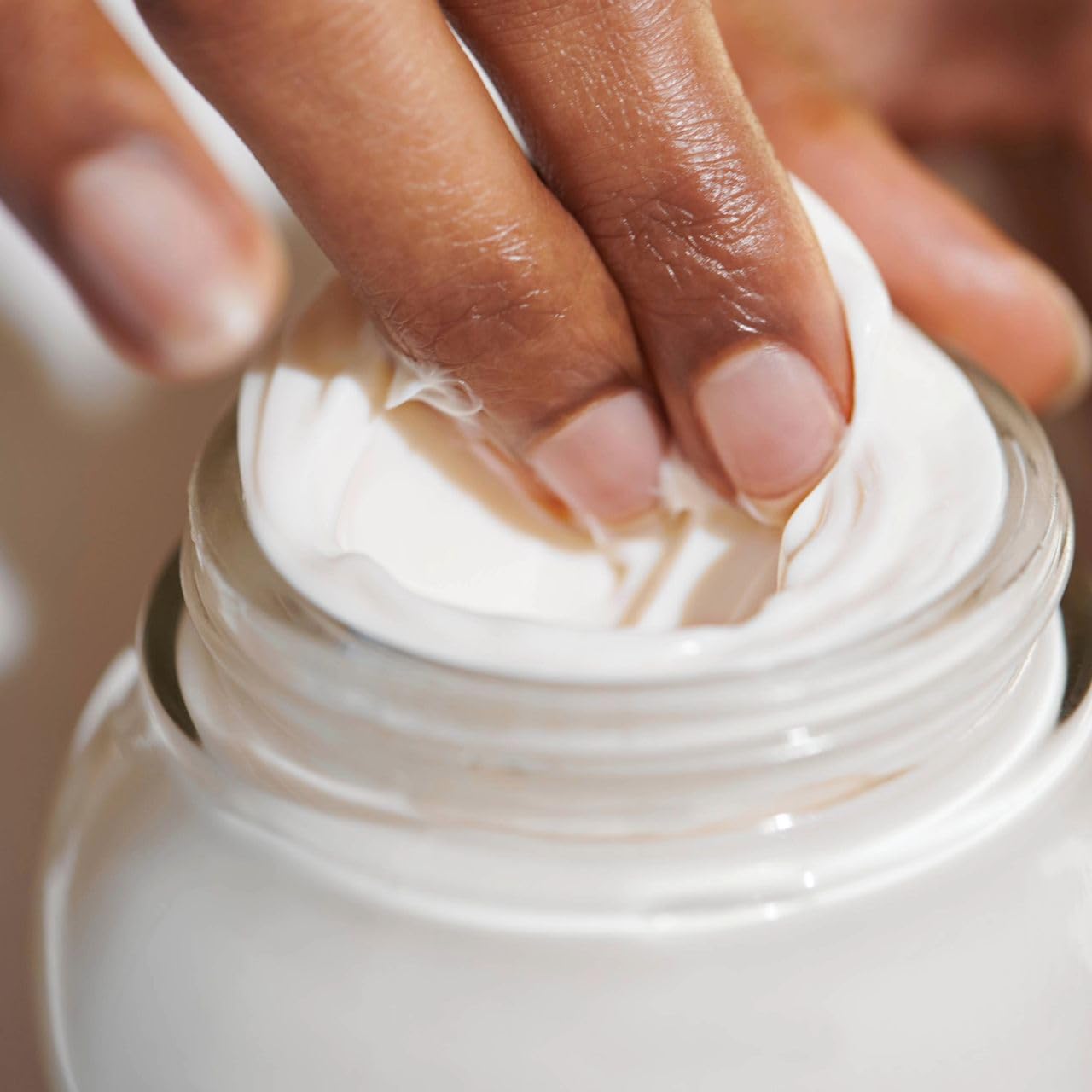 Savannah Bee Company Royal Jelly Body Butter applied to forearm for silky moisture