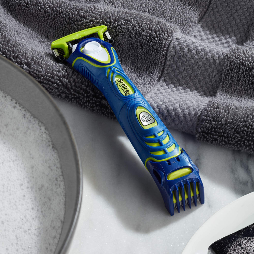 Schick Hydro 5 Groomer sideburn-edging — precise edges around sideburns and under nose.