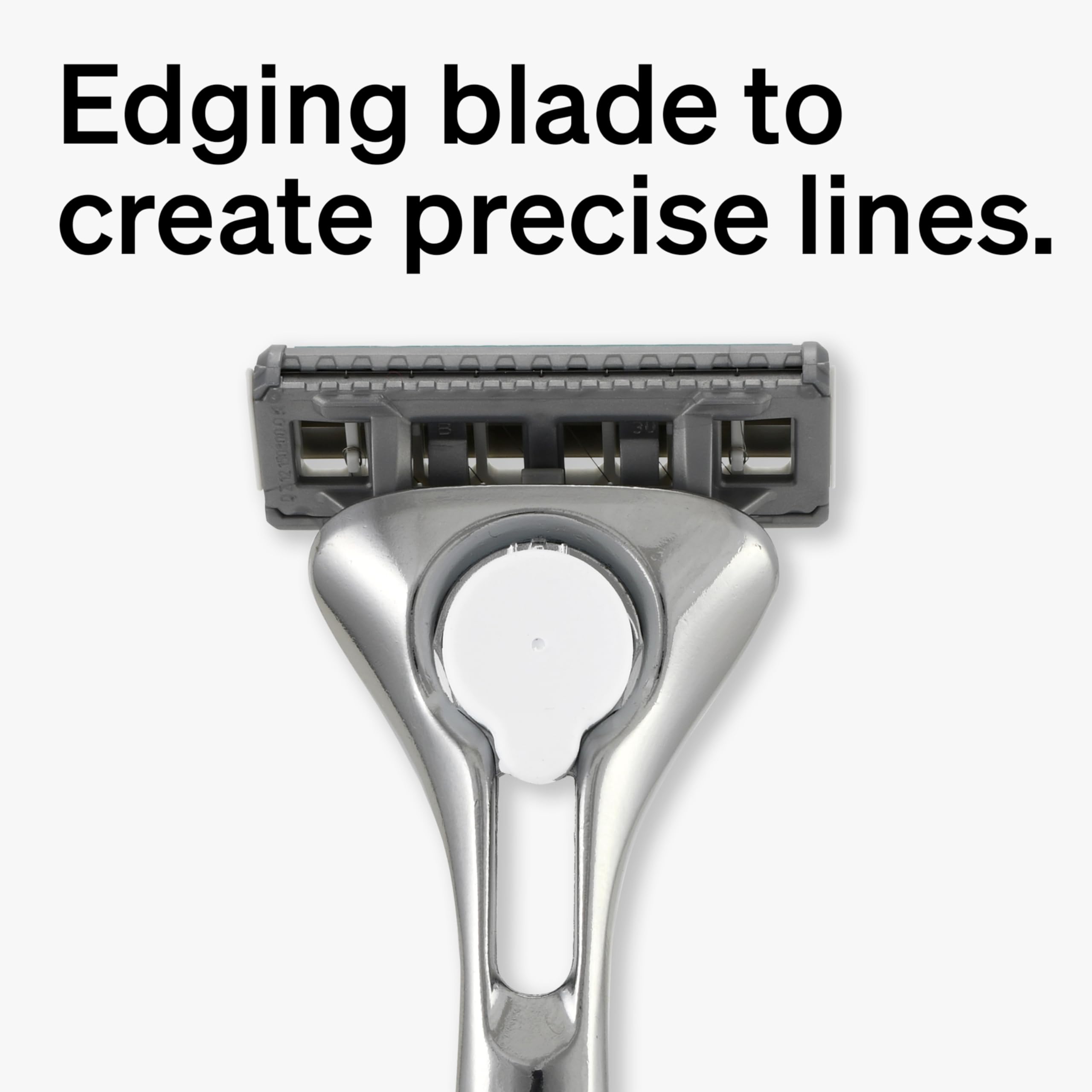 Schick Quattro lubricating strip with Aloe, Vitamin E, Vitamin B5 in view.