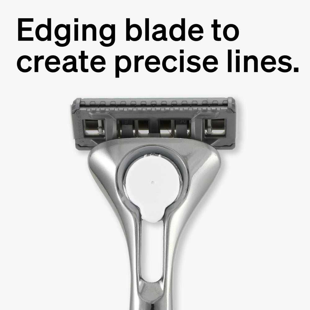 Schick Quattro lubricating strip with Aloe, Vitamin E, Vitamin B5 in view.