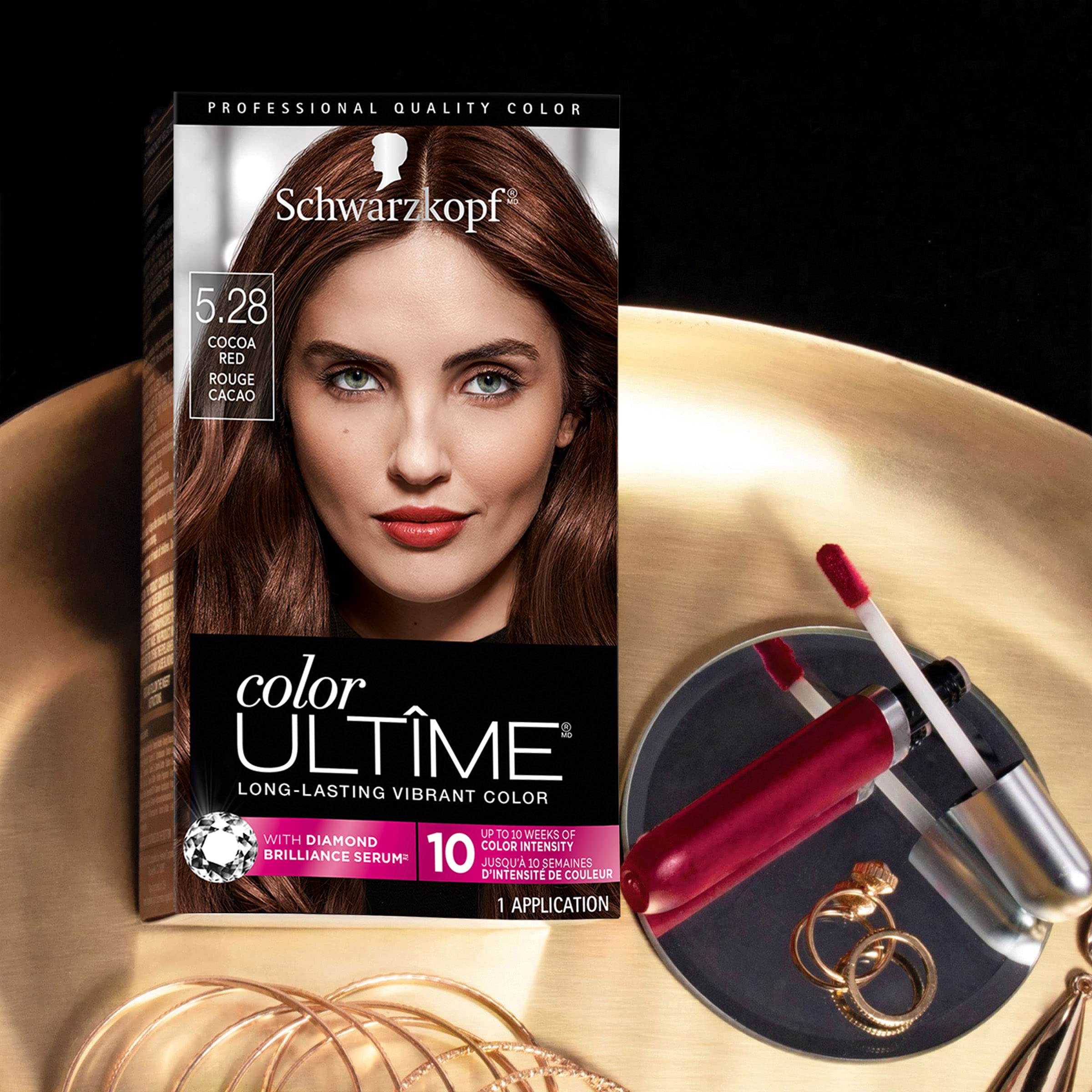 Schwarzkopf Color Ultime color swatch on skin demonstrates rich cocoa red shade.