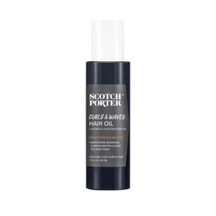 Scotch Porter Curls & Waves Oil bottle pours, sealing in moisture for frizz-free hair.