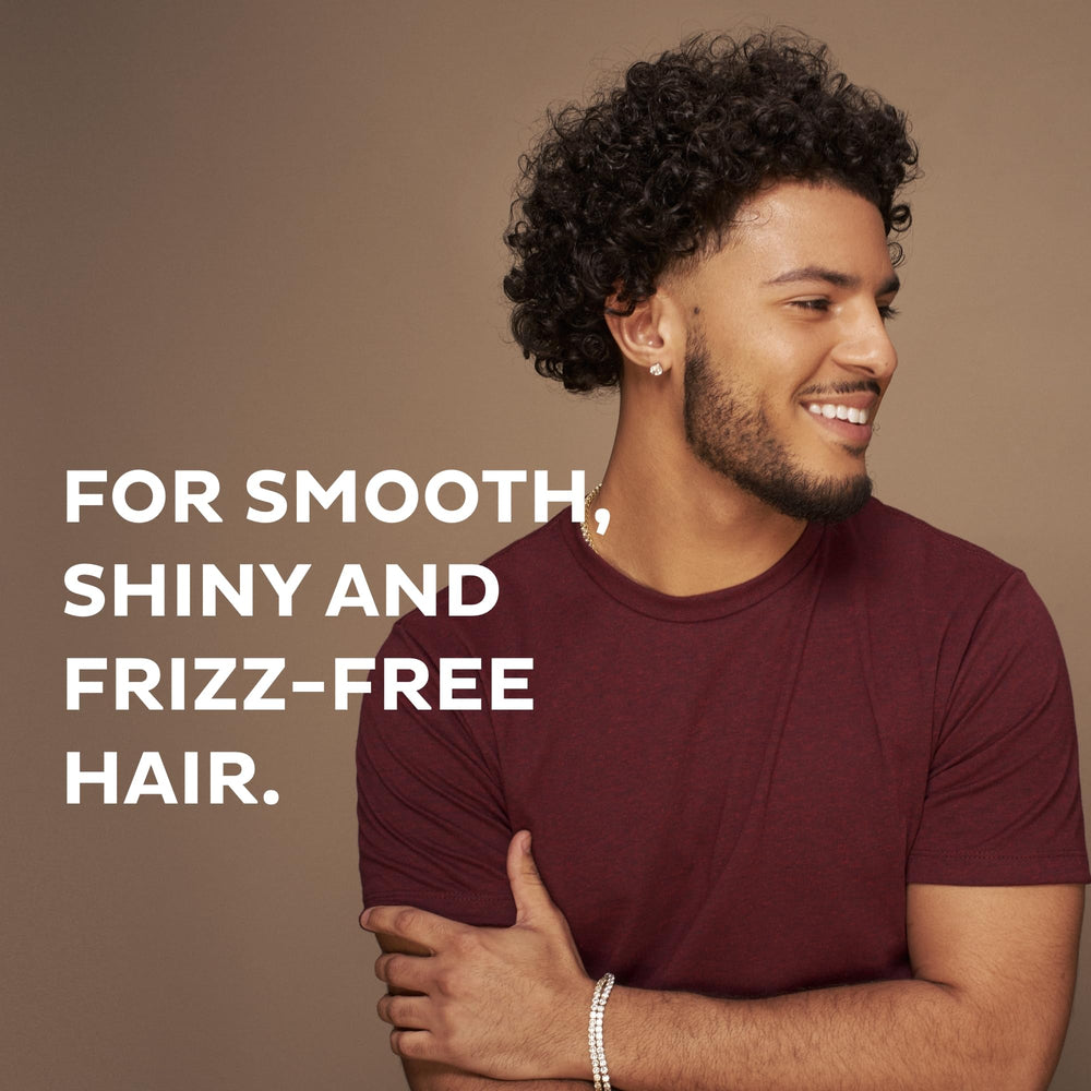 Scotch Porter Curls & Waves Oil applied to damp hair for smooth detangling.