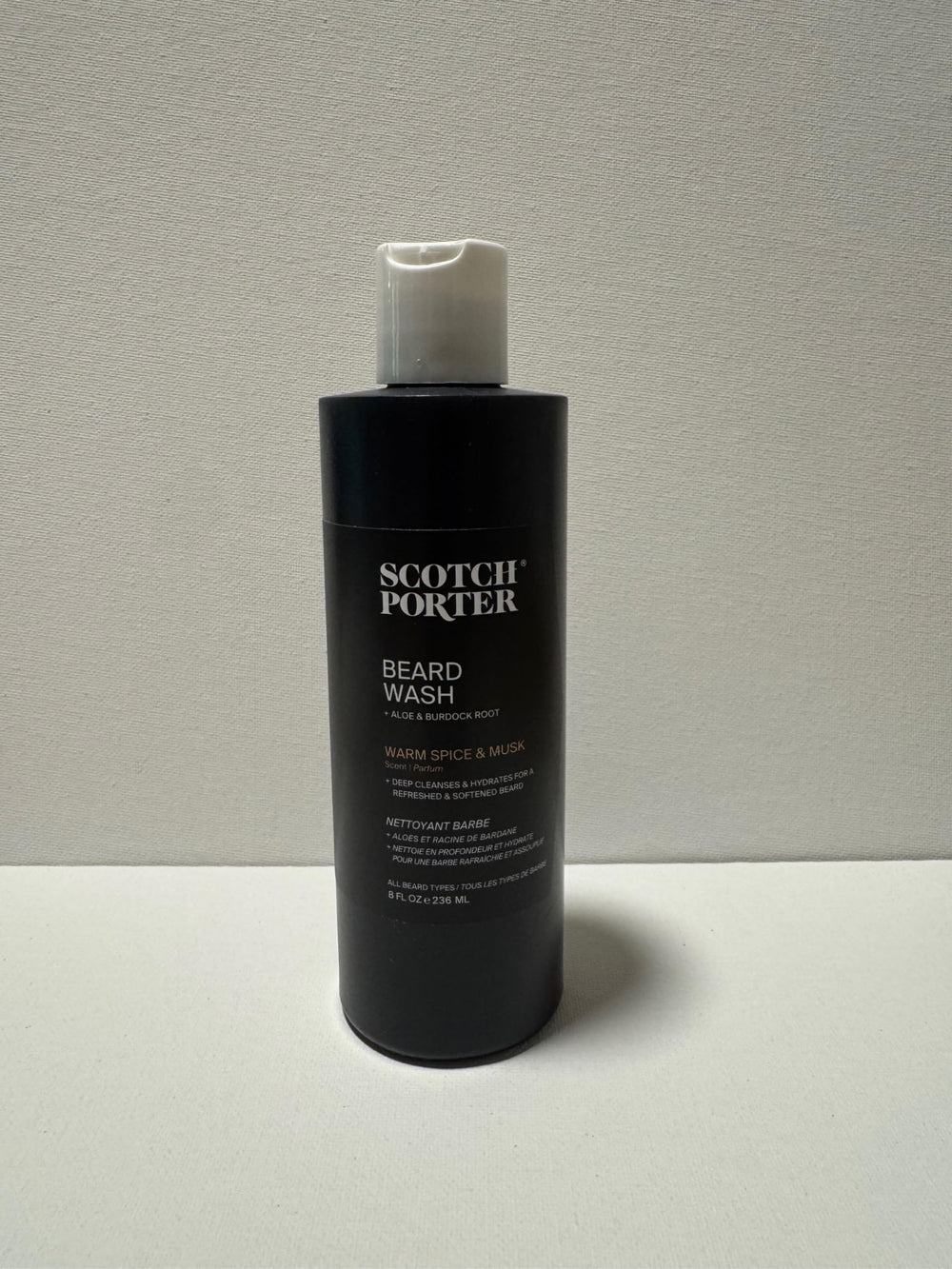 Applying Scotch Porter Beard Wash in the shower for hydrated facial hair.