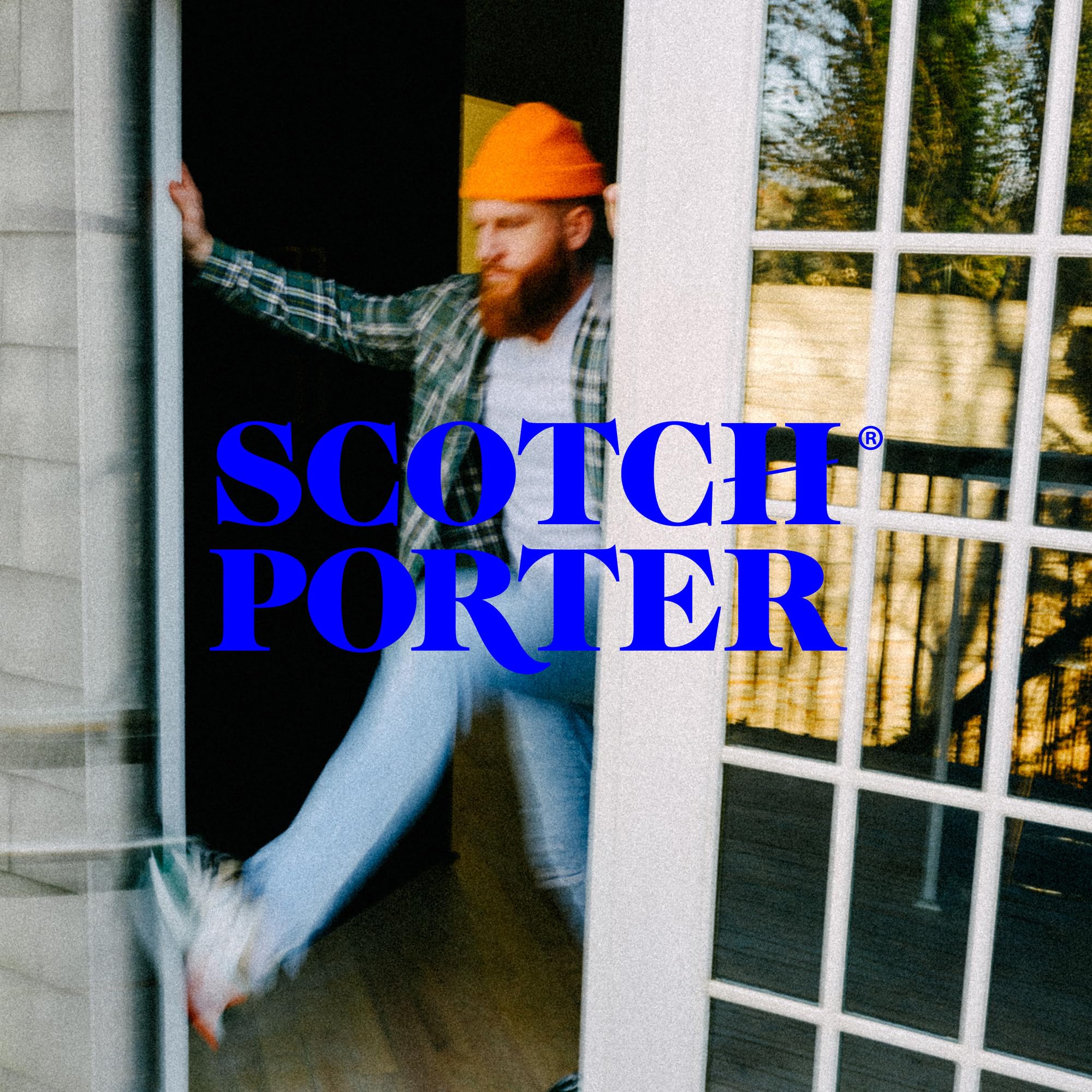 Scotch Porter Restorative Leave-In Conditioner closeup showing Biotin Liposomes for moisture retention.
