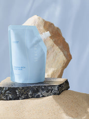 SEACRET Dead Sea Mud application in hands demonstrates cleansing and exfoliation.