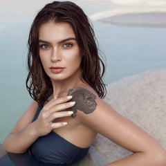 SEACRET Minerals Dead Sea Mud spa ritual setup suggests at-home treatment.