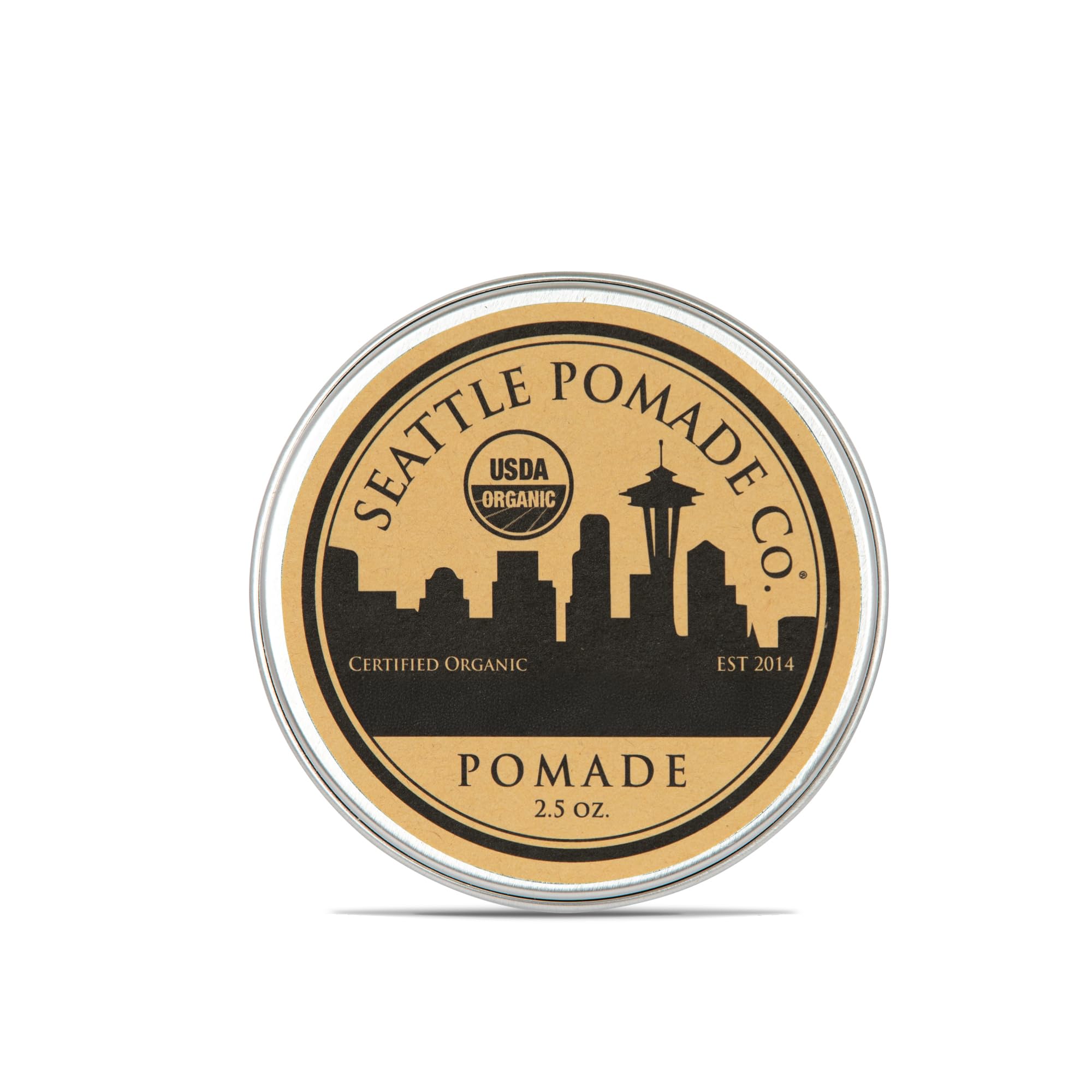 Seattle Pomade Co. organic pomade bottle being poured for balanced hold and shine.