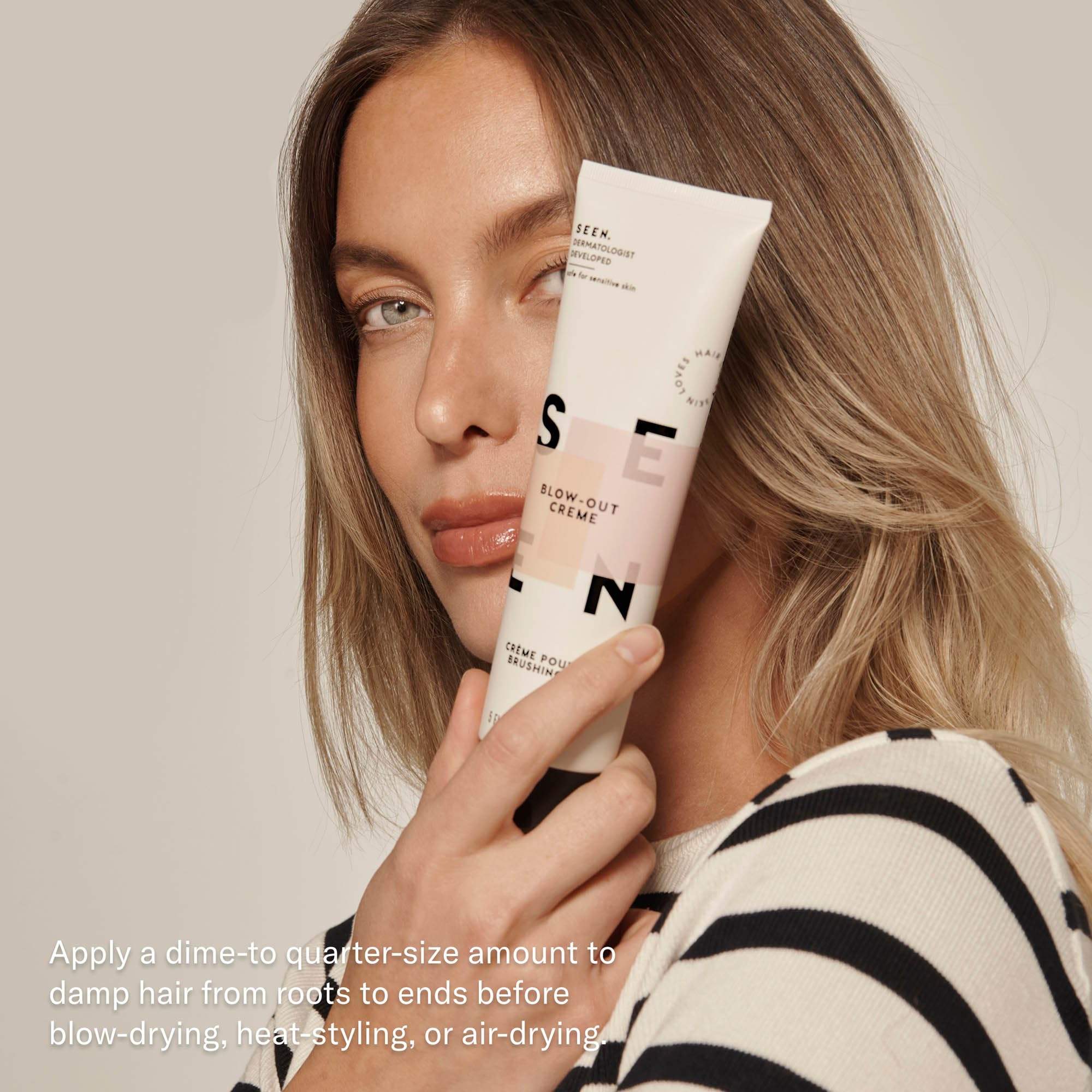 SEEN Blow-Out Creme texture close-up highlights silky feel and frizz control.