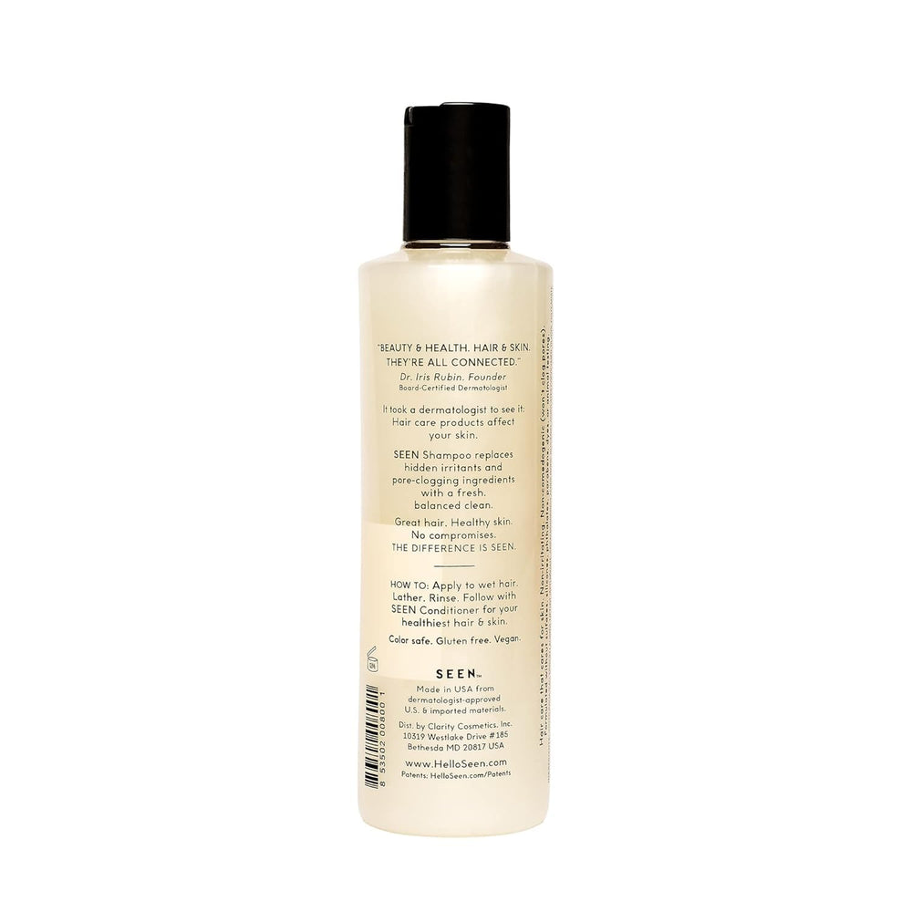 SEEN conditioner bottle front with detangling and frizz control promise