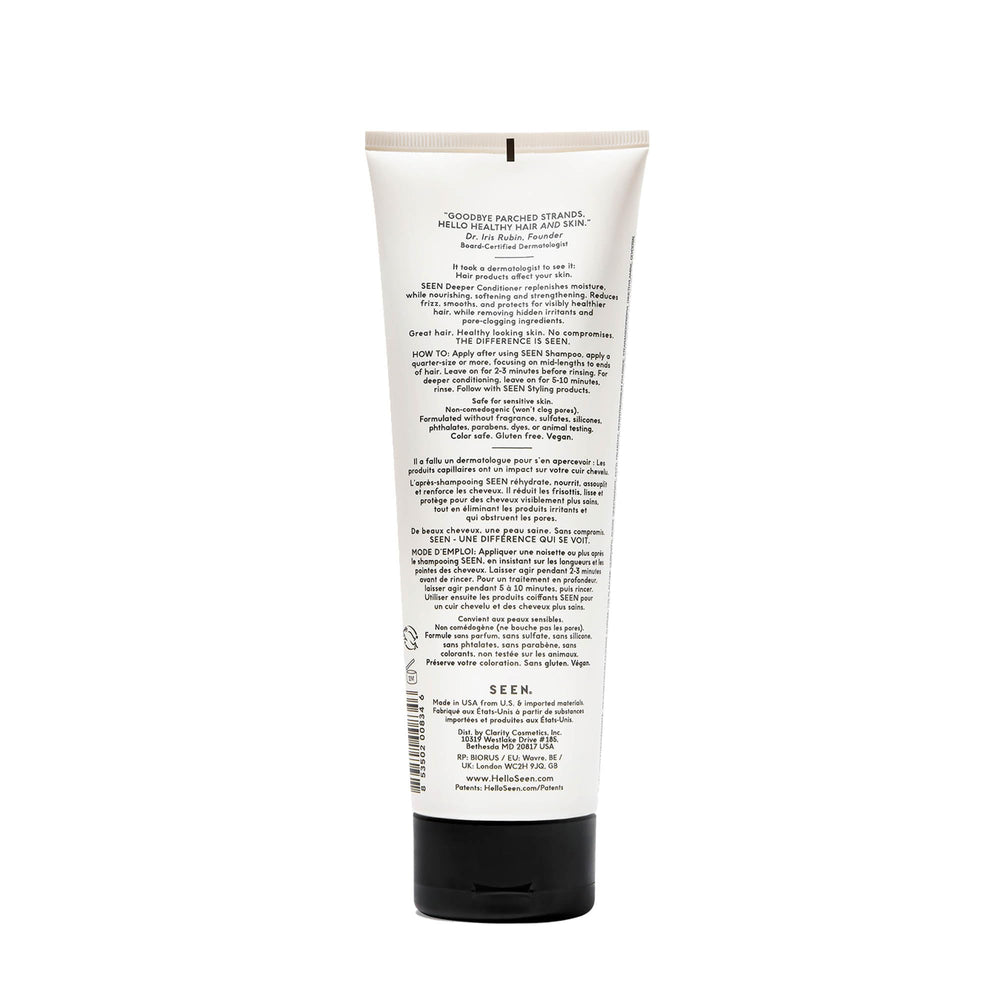  SEEN Deeper Conditioner on hair swatch showing frizz control and softness.