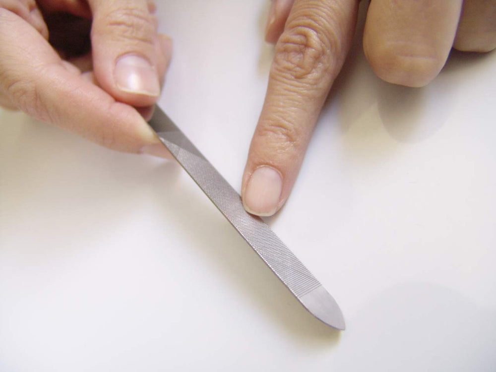 Seki Edge SS-402 under-nail cleaner angle—nail cleaning in one tool.