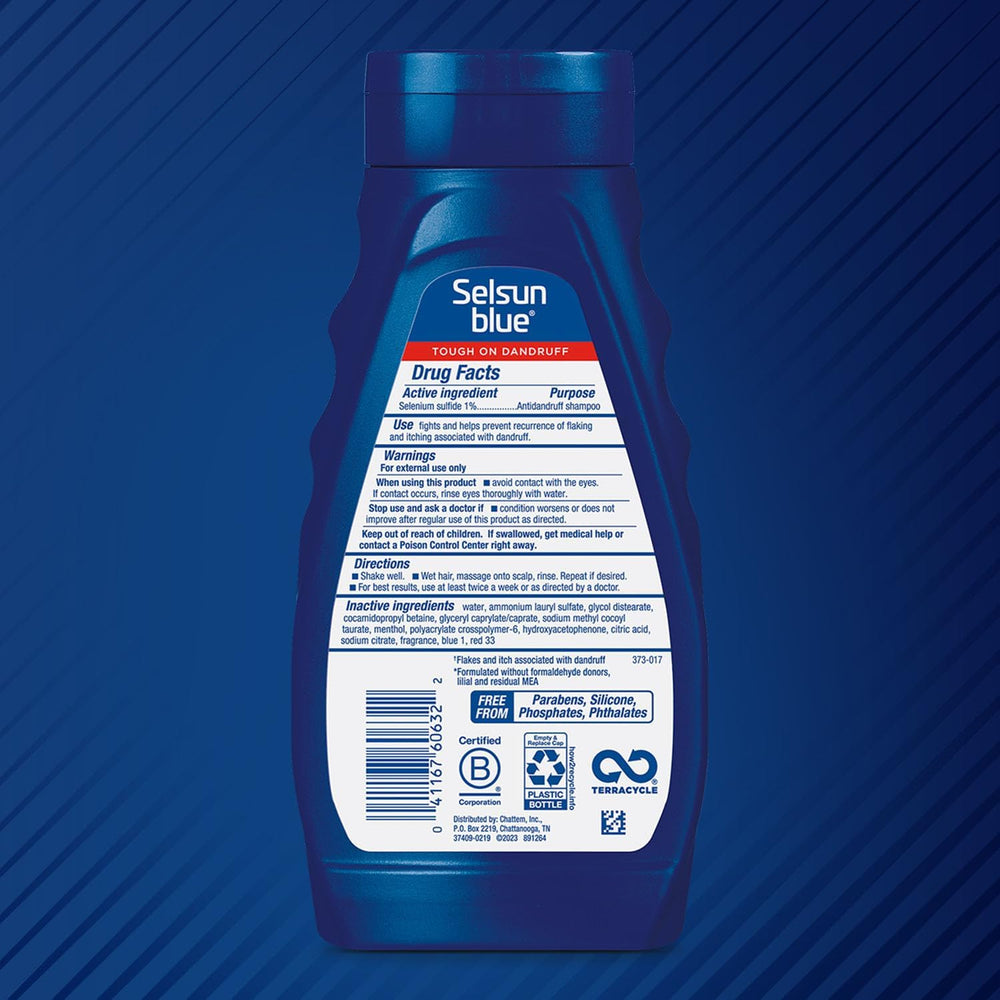 Selsun Blue label closeup showing 1% selenium sulfide for dandruff control.