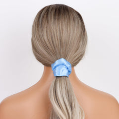 Semato light blue satin scrunchies stay secure during workouts and sports.