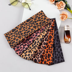 SENMAY leopard-pattern wide band showcased with stylish outfit options.