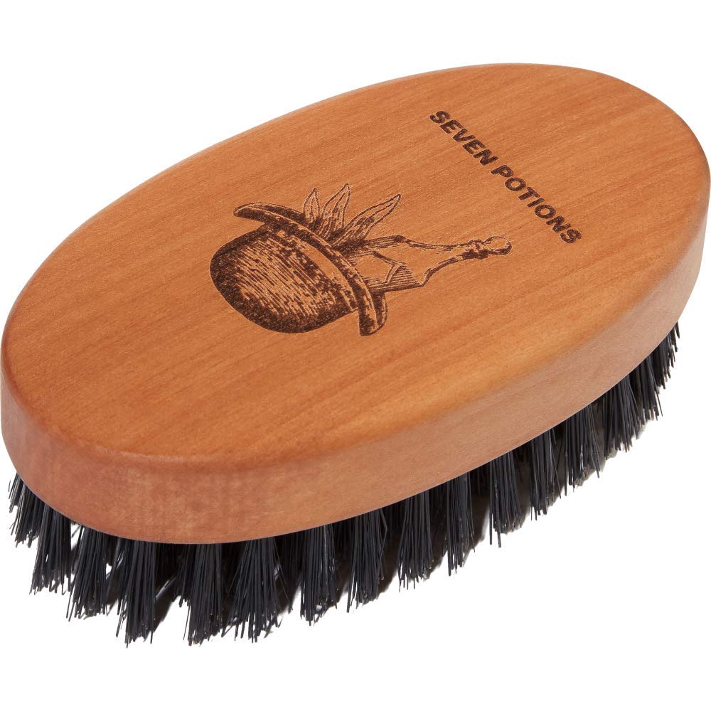 Seven Potions beard brush with first-cut boar bristles for premium control.