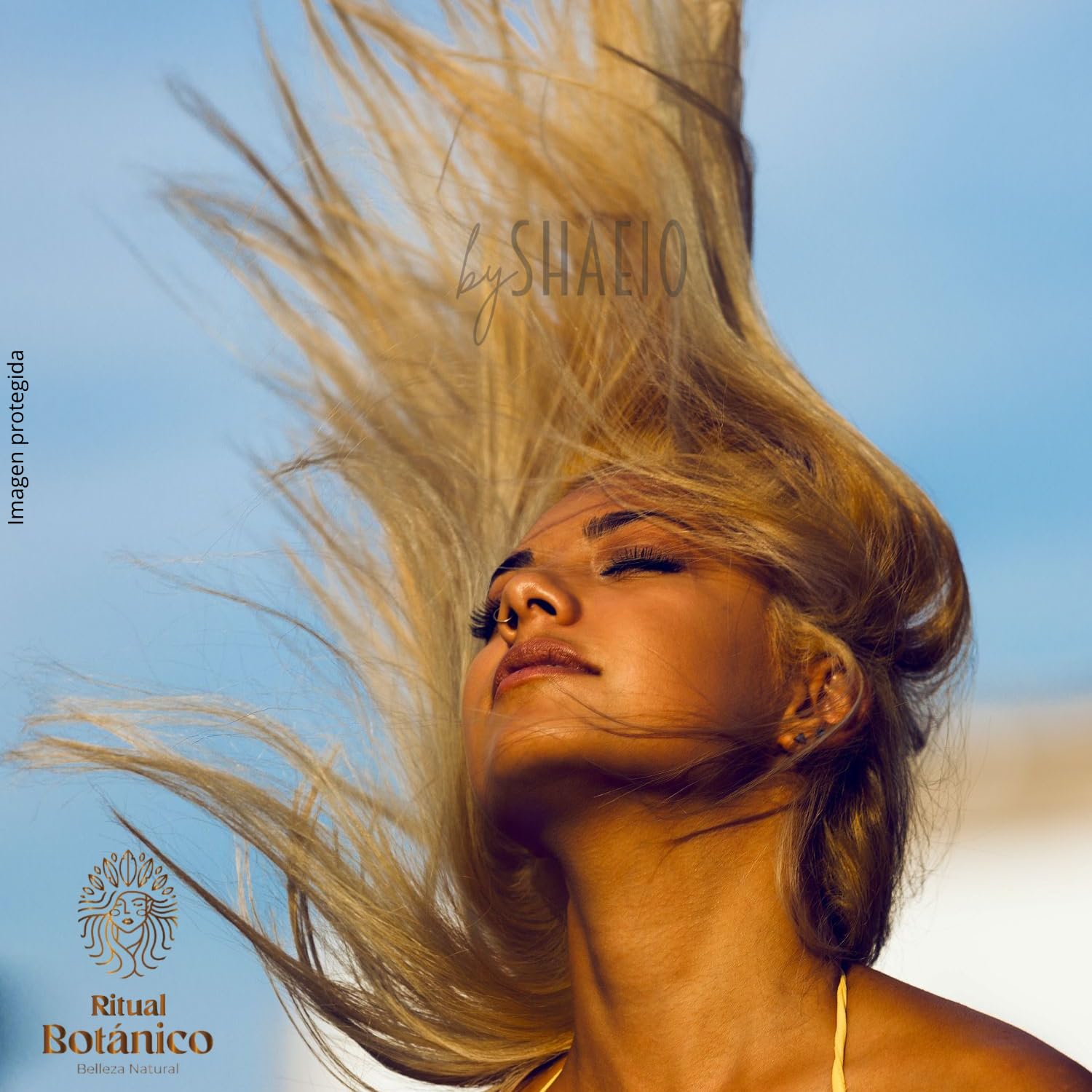 SHAEIO Ritual Botanico hair strand close-up showing enhanced shine and vitality