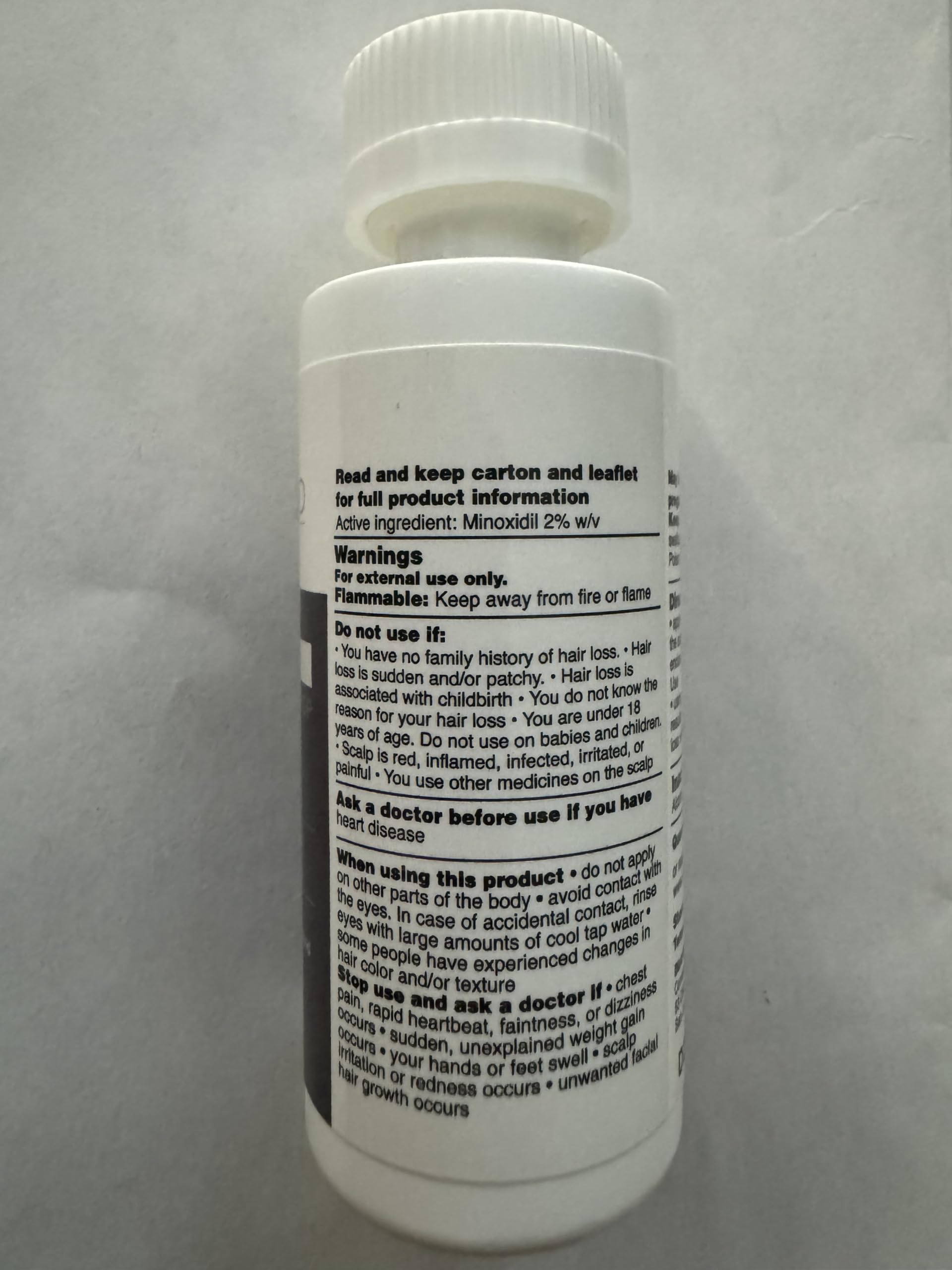 Shapiro MD Minoxidil 2% packaging on a clean vanity with brand cues