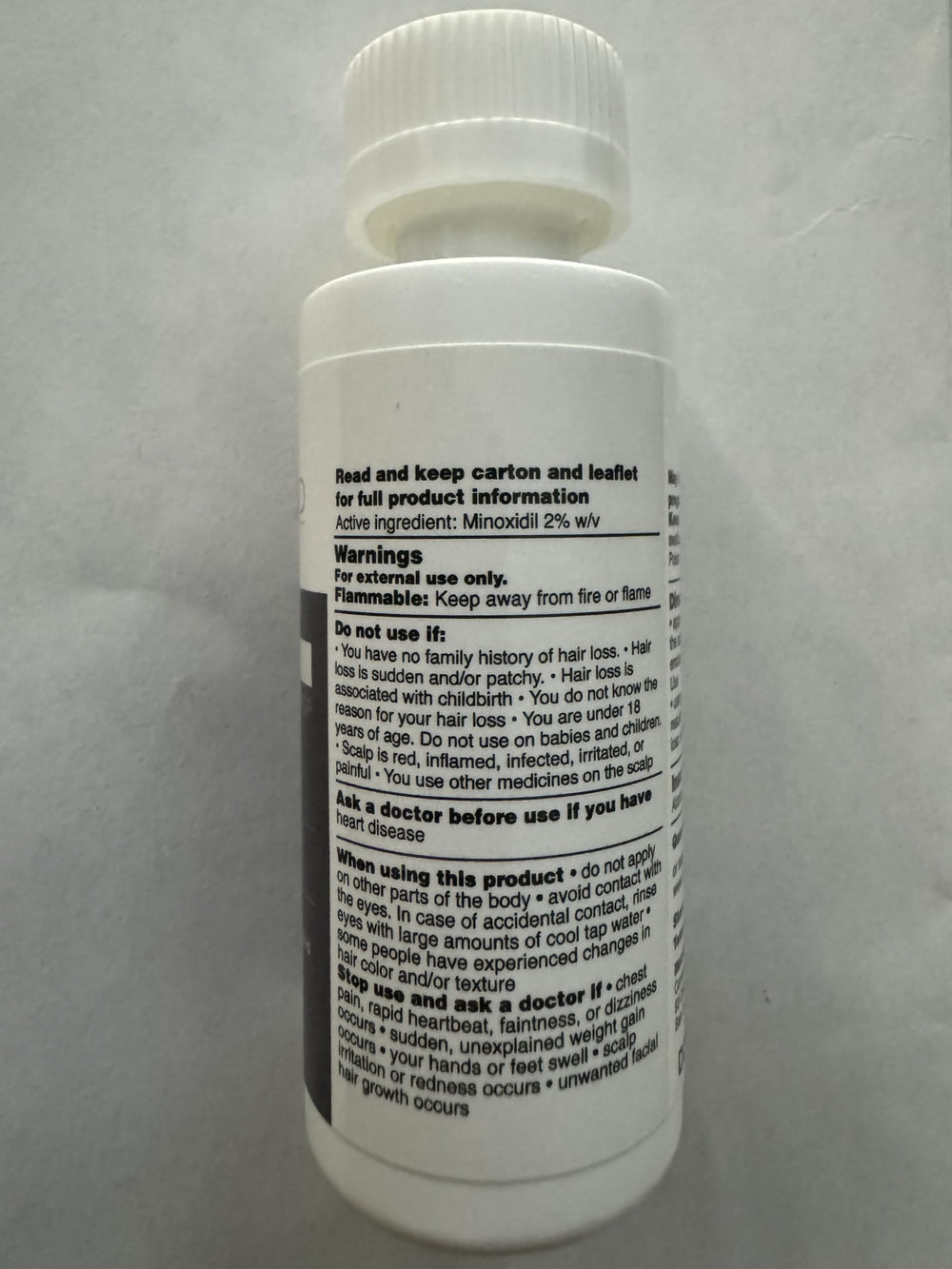 Shapiro MD Minoxidil 2% packaging on a clean vanity with brand cues