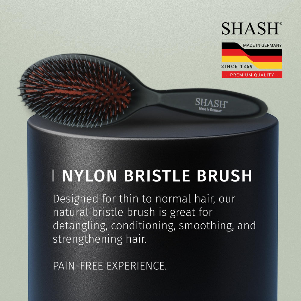 SHASH dry-hair brushing action highlights root-to-tip oil distribution.