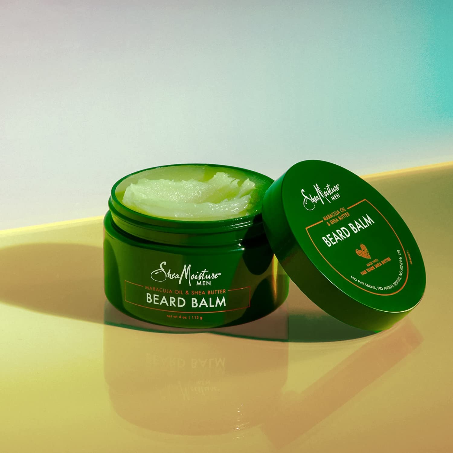 Closeup of SheaMoisture beard balm tin jar packaging