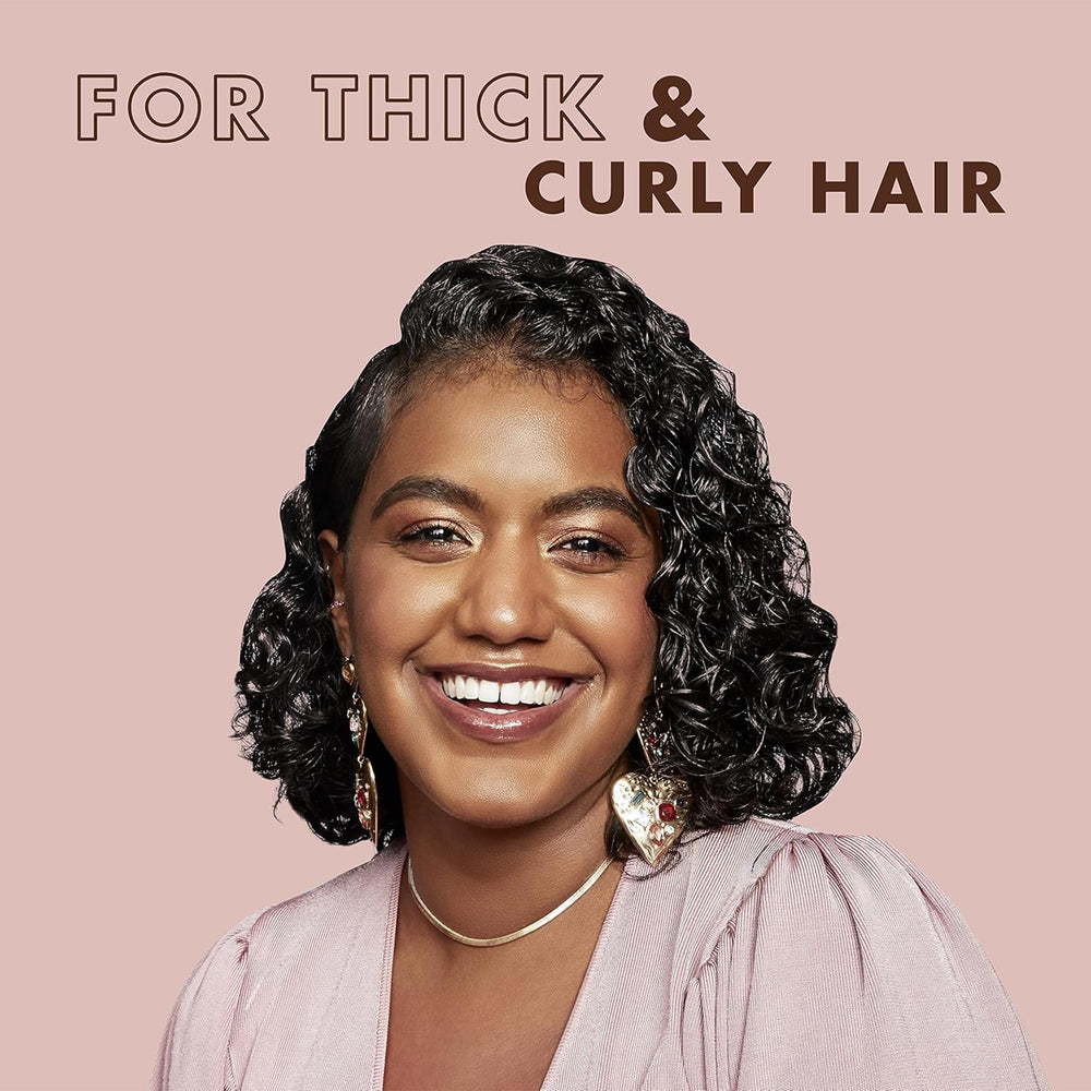 Sheamoisture Curl Enhancing Smoothie jar demonstrates smooth texture for styling