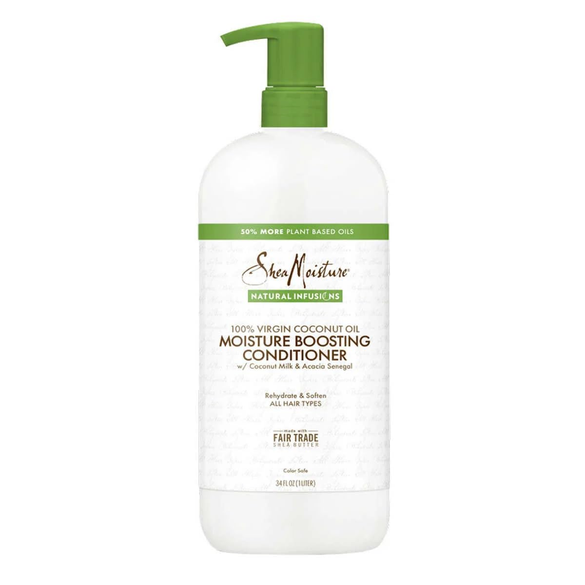 SheaMoisture Coconut Oil Moisture Boosting Conditioner bottle pour provides hydrated hair.