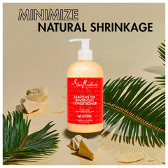 SheaMoisture conditioner on wet hair mid-length shows even application.