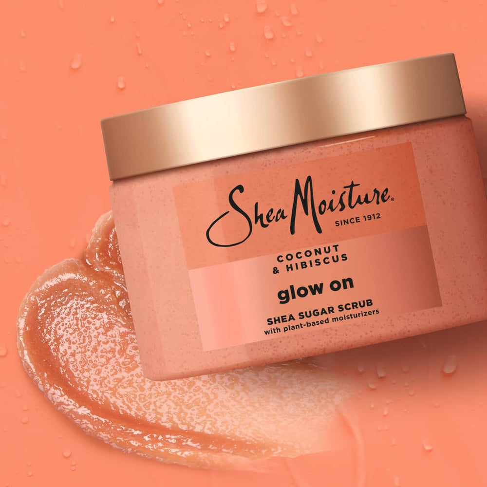 Bottle of SheaMoisture Glowing Radiance Scrub on wood background for natural care