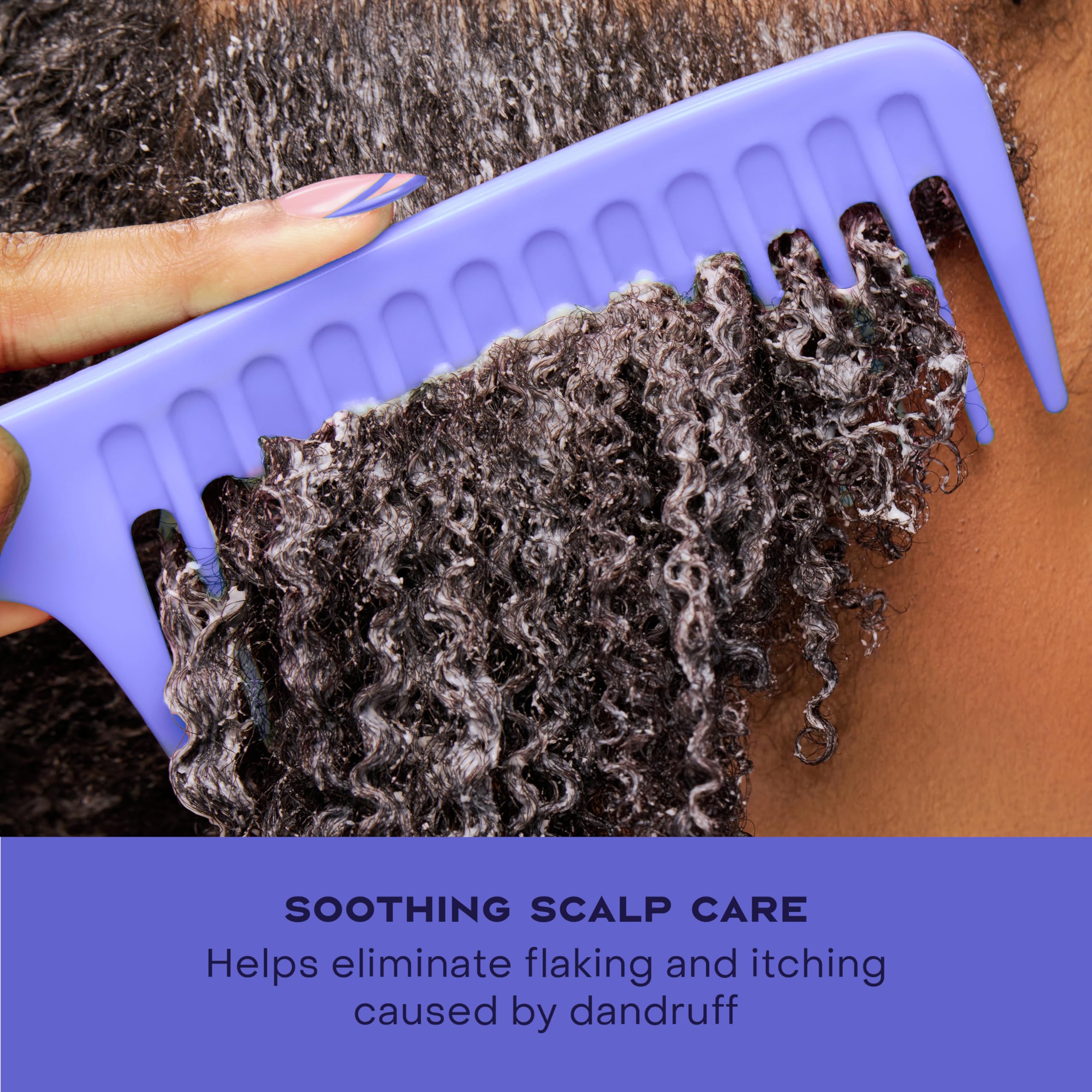 SheaMoisture hair after conditioner image shows smoothness and natural shine post rinse.