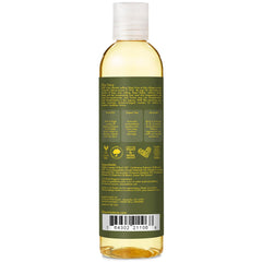 Pouring SheaMoisture Olive & Green Tea Oil for bath-time application