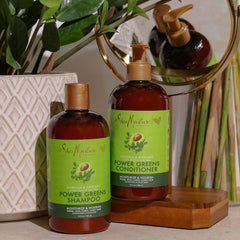 Conditioner application on curls demonstrates detangling and nourishment.