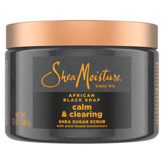 SheaMoisture Sugar Body Scrub African Black Soap jar closeup for nourishing, glowing melanin-rich skin