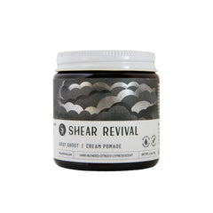 Shear Revival Gray Ghost Cream Pomade in amber glass jar delivers strong hold and matte finish.