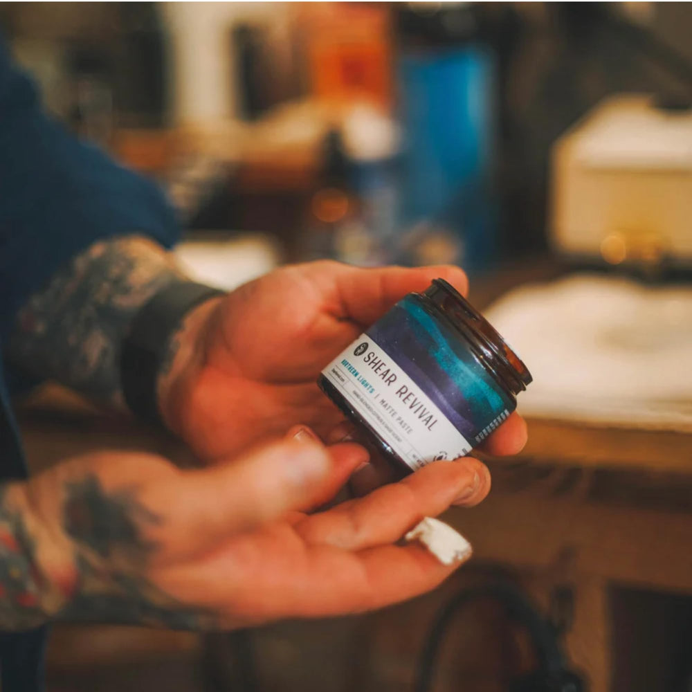 Shear Revival Northern Lights paste applied to towel-dried hair to create textured volume.