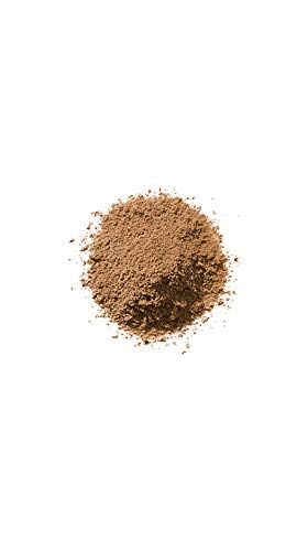 Mineral foundation powder close-up showing a soft, light-reflecting finish.