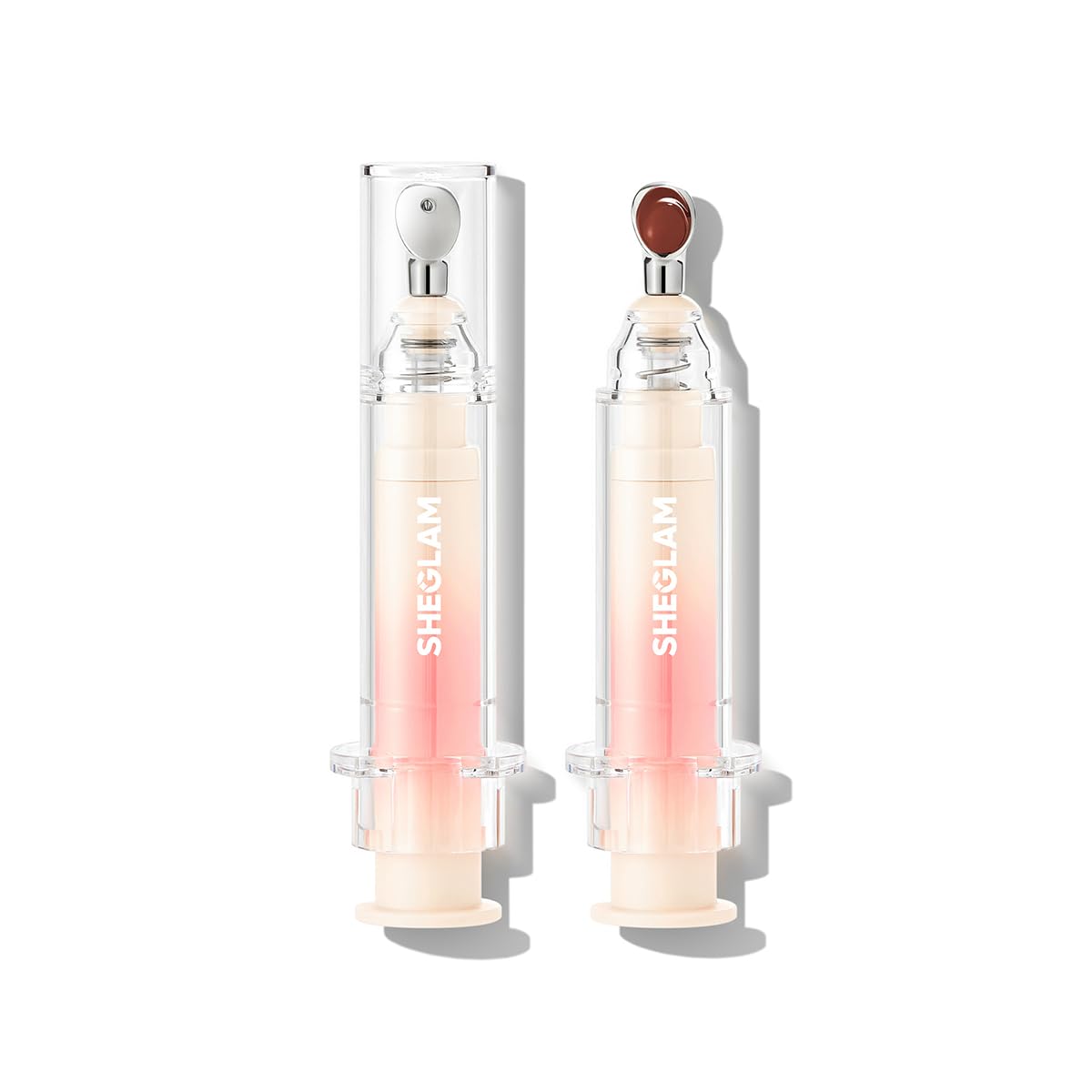 SHEGLAM Booster Shine Lip Gloss Sepia Kiss packaging close-up for sleek, mess-free application