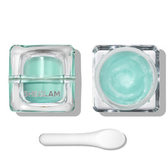 SHEGLAM Glacier Glo Primer bottle close-up shows smooth makeup prep.