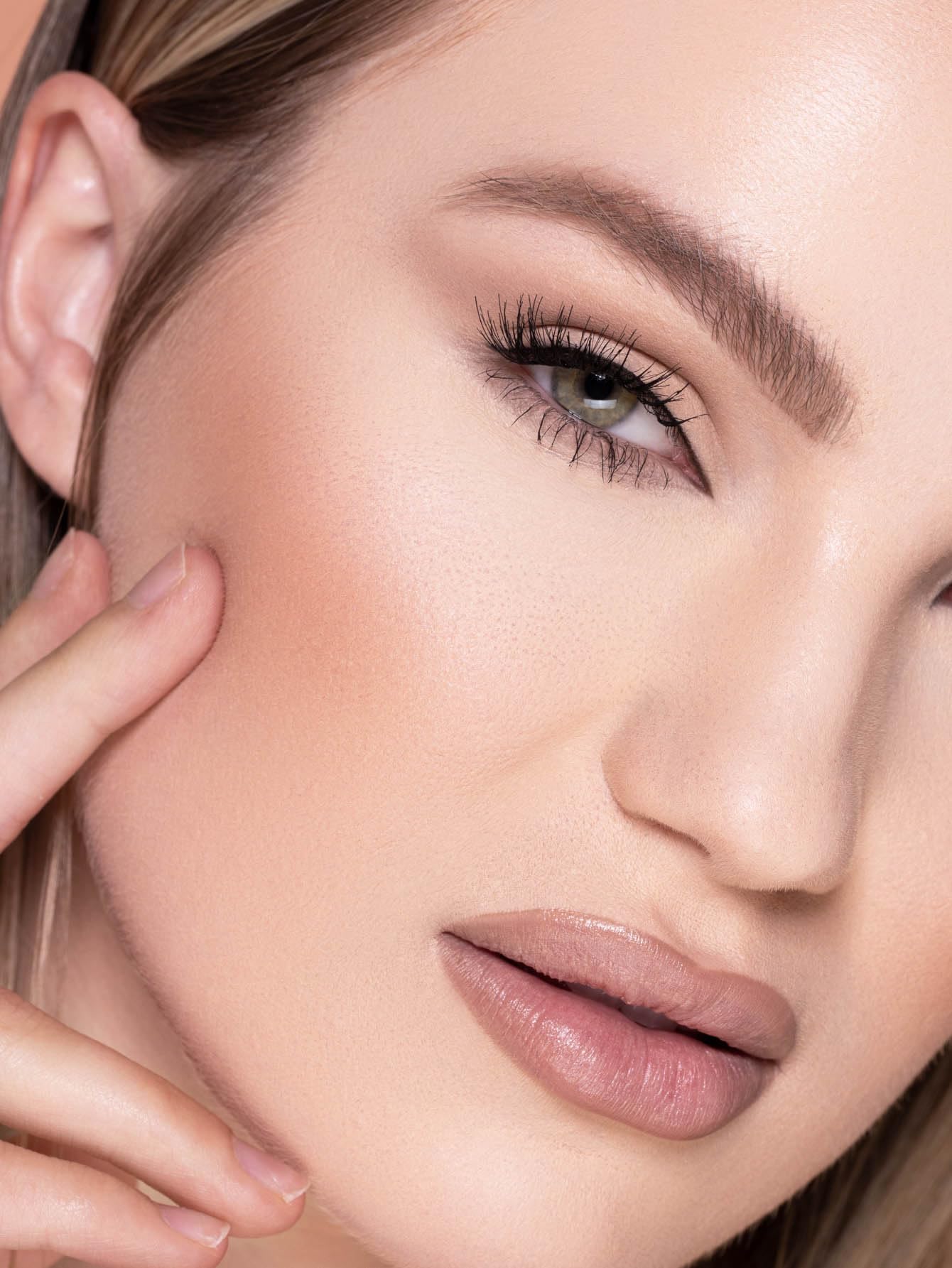 SHEGLAM porcelain foundation application shows buildable coverage with natural look.