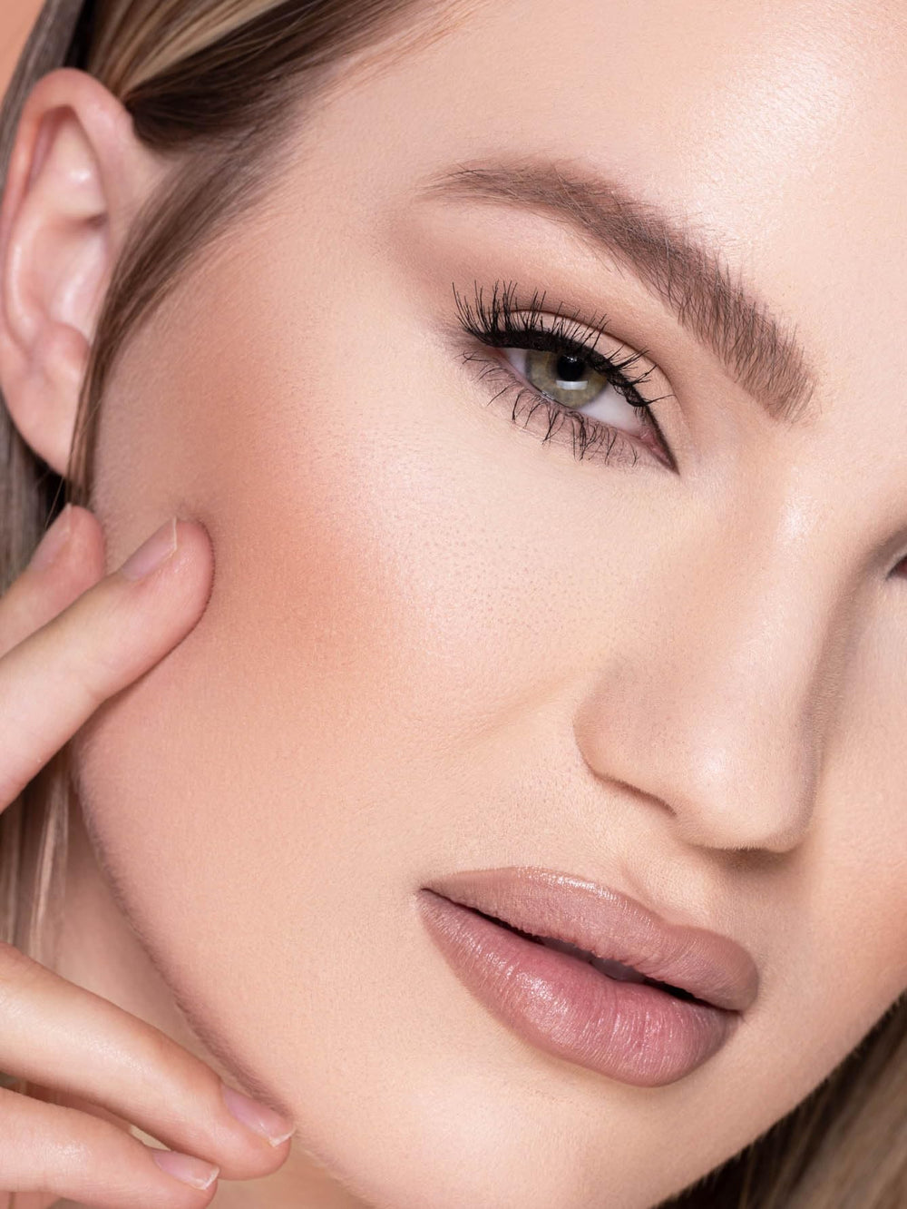 SHEGLAM porcelain foundation application shows buildable coverage with natural look.