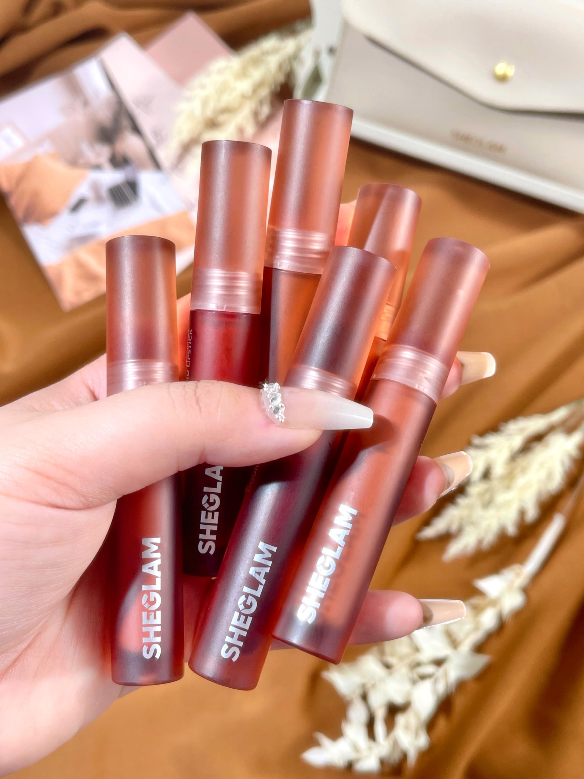 SHEGLAM Soft Haze Lip Blur long-wear shot suggests color stays through busy moments