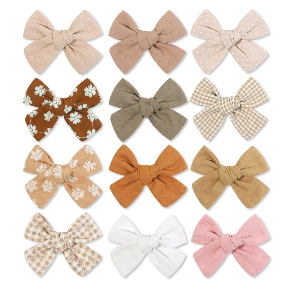 Shelbybox baby girl hair clips 12-pack fashion bows add versatile styling.