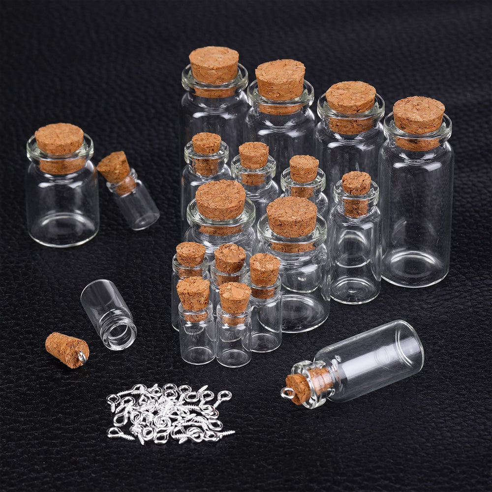 Sherli five-size clear glass bottles versatile for charms and treasures.