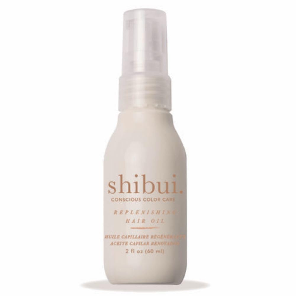 SHIBUI Replenishing Hair Oil bottle close-up with luminous shine and vegan formula.