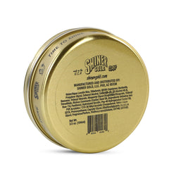 Shiner Gold Clay Pomade bottle with coconut scent cue for sensory grooming.