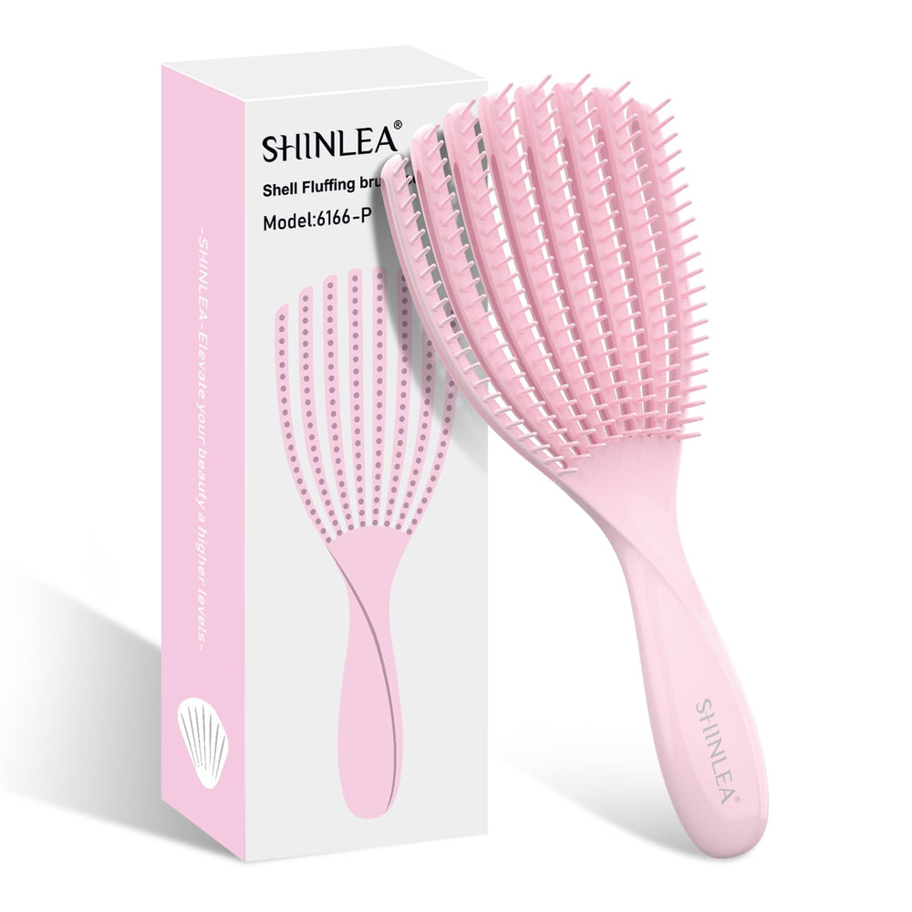 SHINLEA detangler brush closeup shows shell design for gentle detangling.