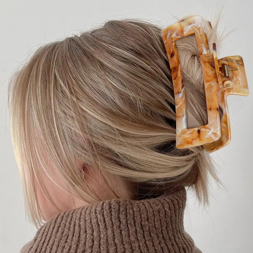SHINLEA purple ink-paint clip adds flair while keeping hair tidy during errands
