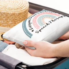 Shinylin rainbow speech-therapy cosmetic bag close-up shows organized makeup storage with bright print.