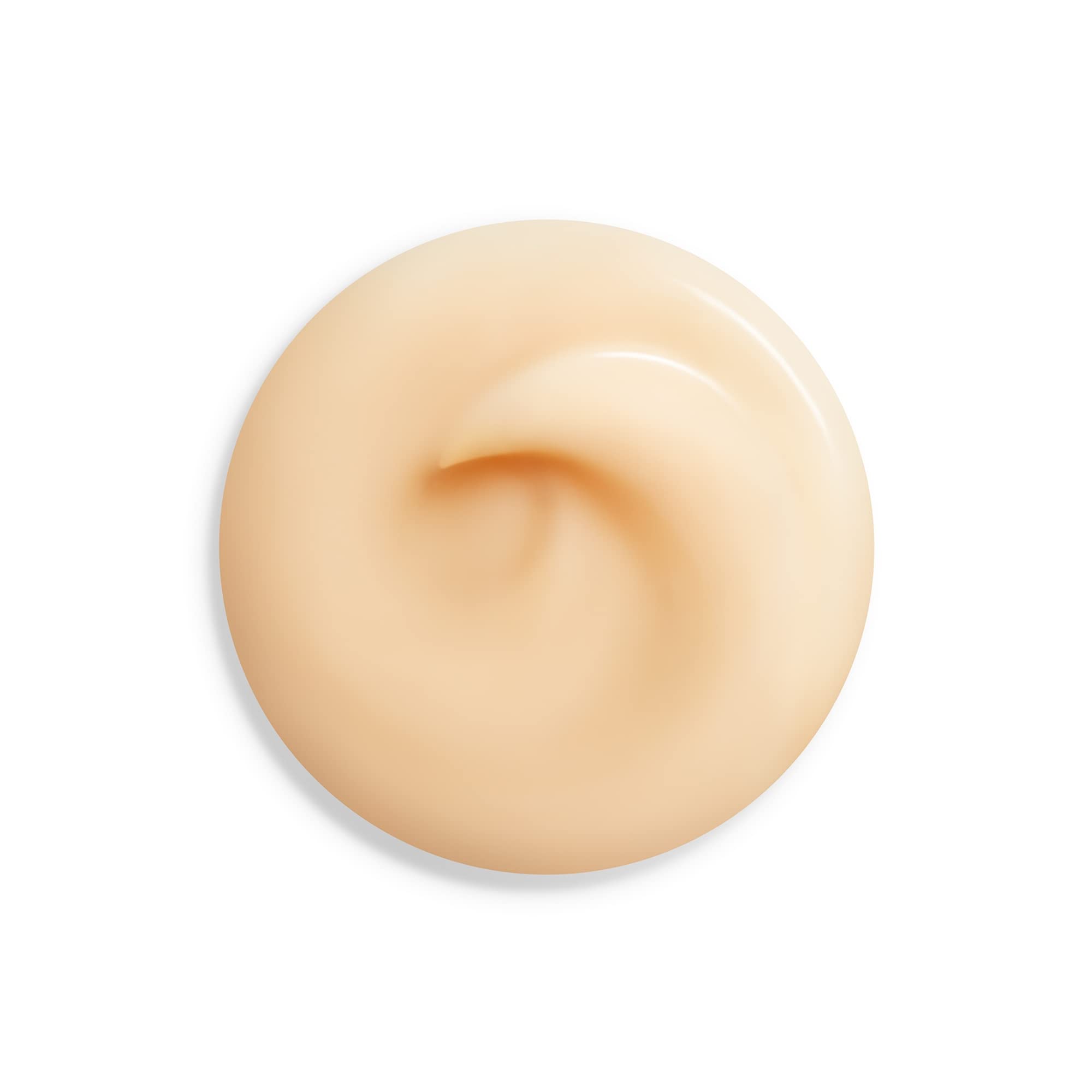Shiseido Benefiance texture on fingertip shows rich, smooth overnight moisture.