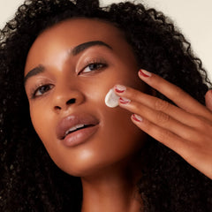 Shiseido Benefiance wrinkle-smoothing-cream-enriched face-application closeup demonstrates even distribution for hydration.
